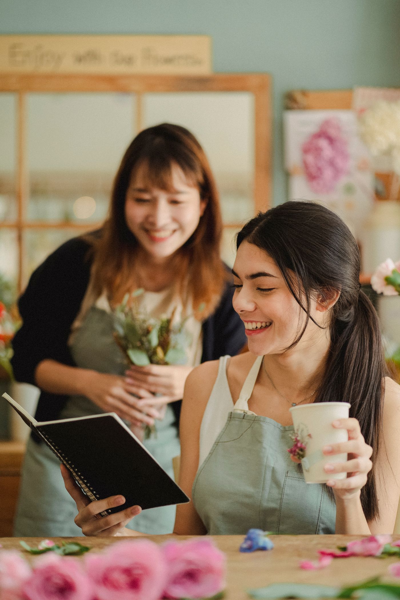 Two florists going over an order