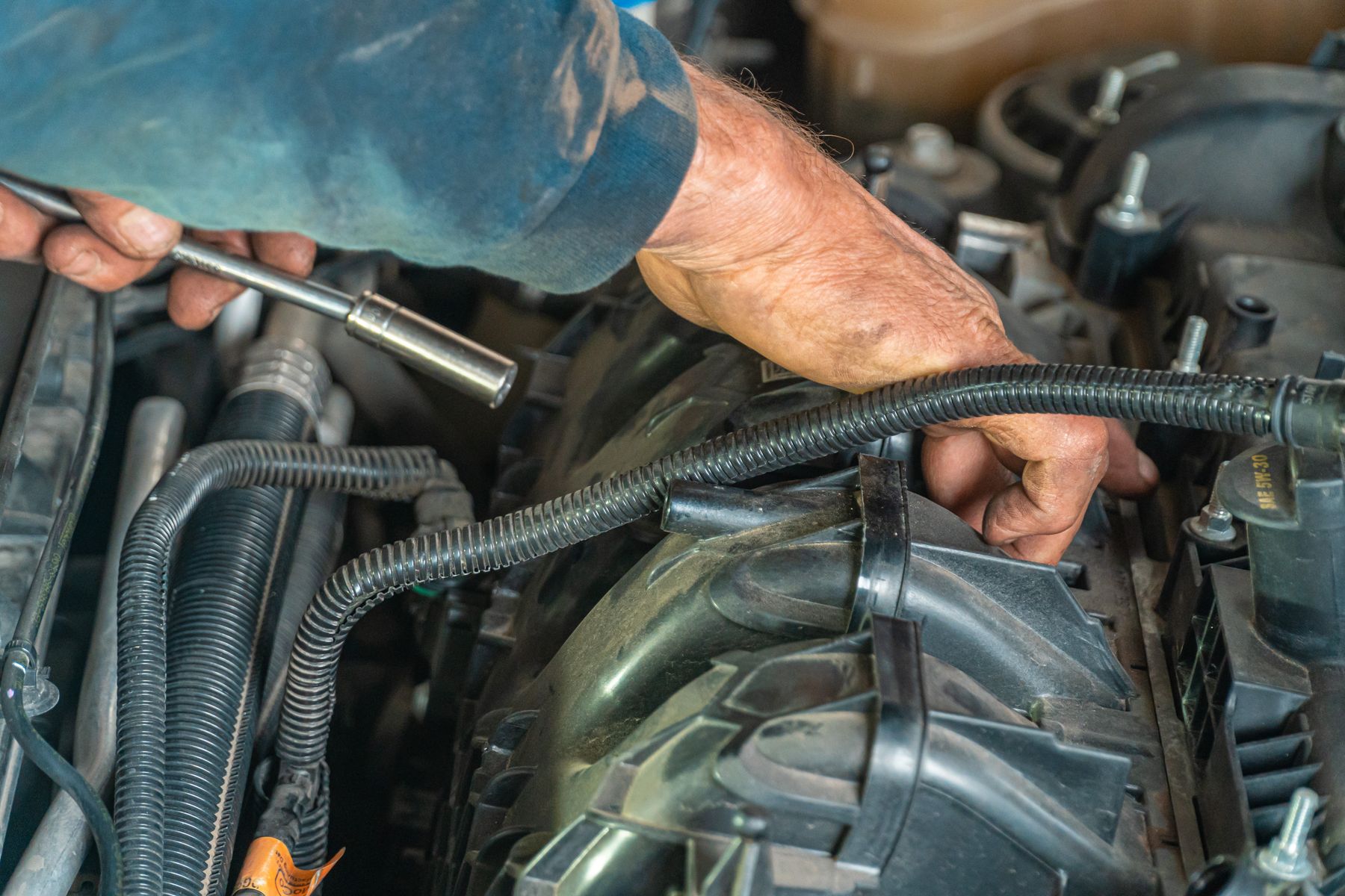 Mechanic working on an engine