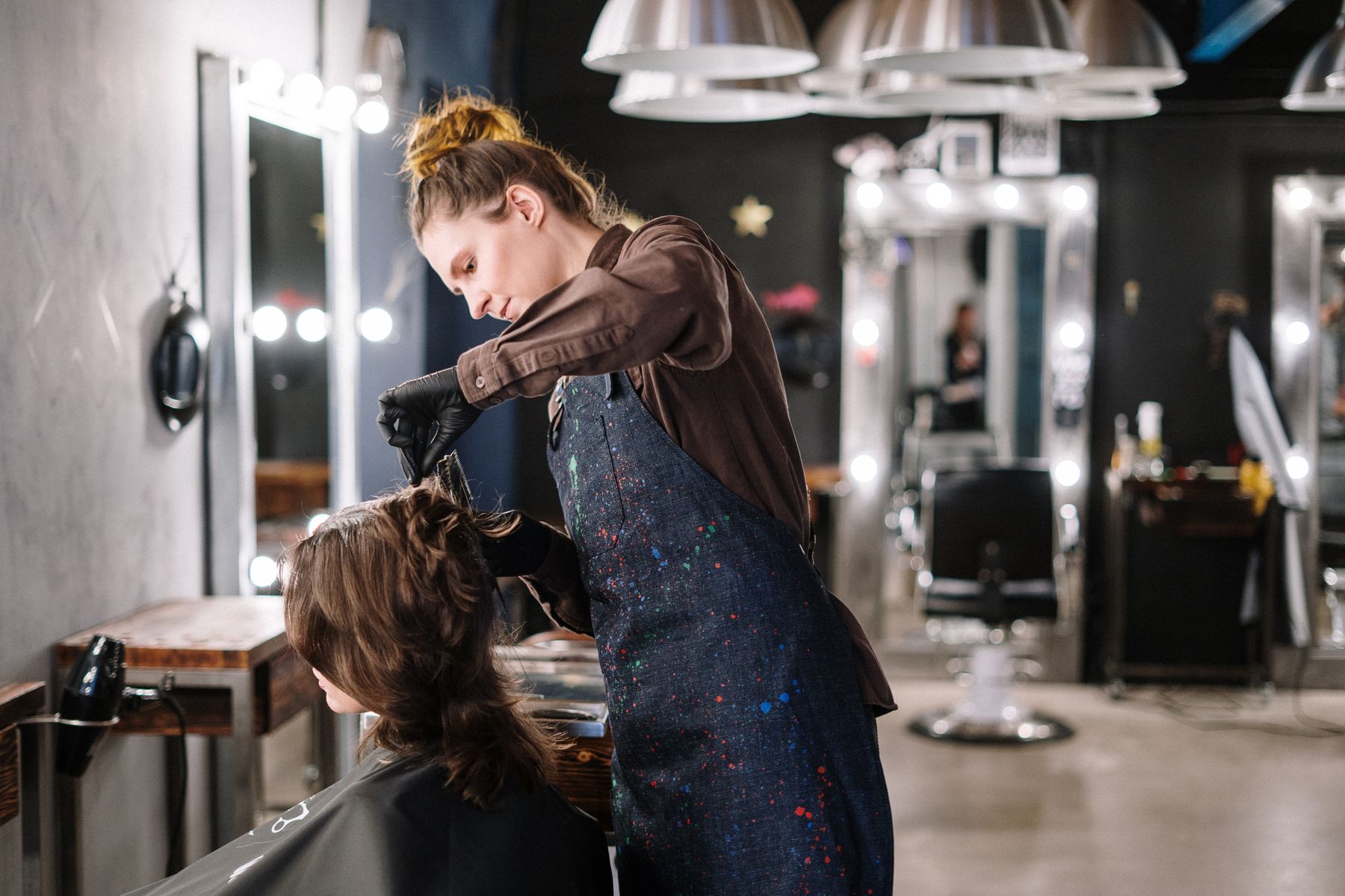 Stylist working on a client